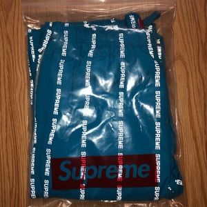 Supreme reflective text pants
